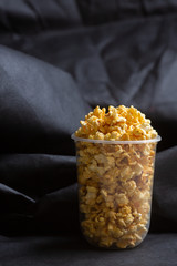 Popcorn in a large bucket.