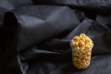 Popcorn in a large bucket.