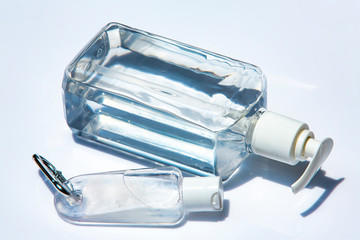 People's hands using portable wash hand sanitizer gel pump dispenser with alcohol gel sanitizer on white, Close up shot, Prevention from covid19, Bacteria, Healthcare, 7 step wash hand