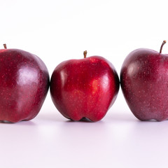 Big fresh red apples on white background
