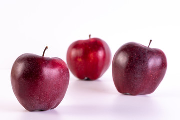 Big fresh red apples on white background