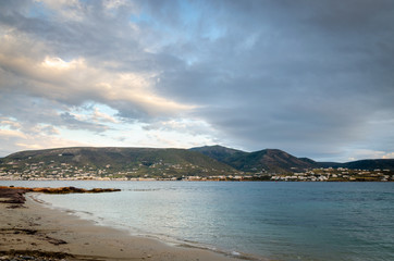 Fototapeta na wymiar Sea bay on a cloudy day on the island of Paros. Cyclades. Greece
