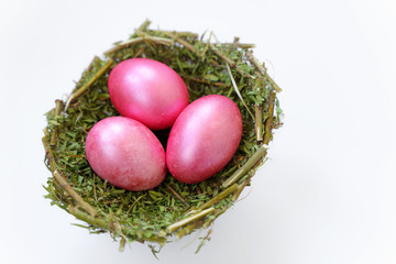colored eggs TO EASTER. BACKGROUND pink EGGS