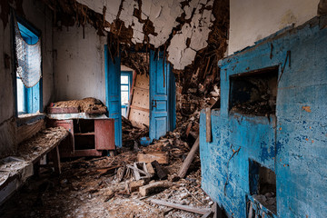 Decaying interior of an abandoned home in a small village near Chernobyl