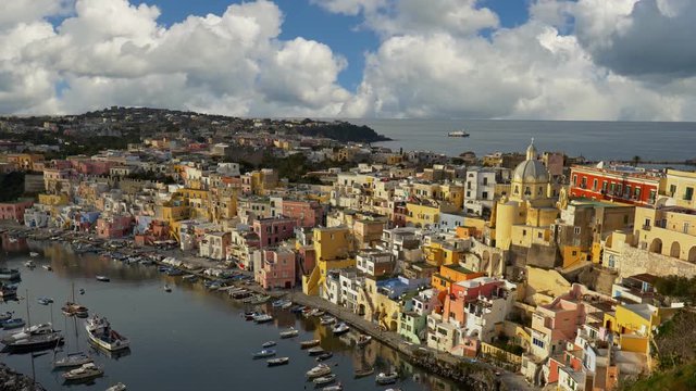 Panoramic shot of Corriccella village in Procida island. Colourful small italian fisherman village near Naples. Italy, Naples. 4K