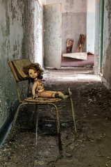 Fototapeta na wymiar Abandoned doll in Chernobyl/Pripyat in the Exclusion Zone