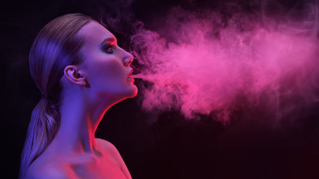 Woman Smokes Hookah