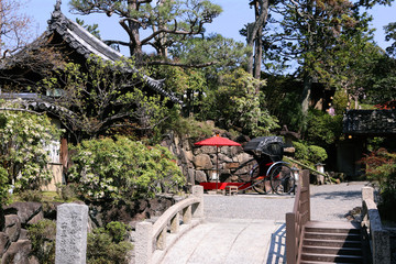 Traditional garden in Japan with rickshaw