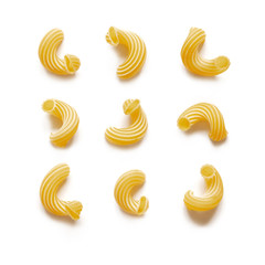 Italian pasta laid out on a white background. White background, isolate. Concept - food stocks during the covid-19 epidemic