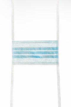 Disposable Hygiene Medical Mask With Strings On White Background