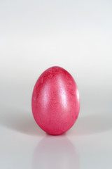 pink easter egg on a white background. easter decoration. colored eggs.