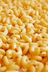 Italian pasta laid out on a white background. Background from pasta, isolate. Concept - food stocks during the covid-19 epidemic