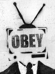 TV head with message OBEY - obrazy, fototapety, plakaty