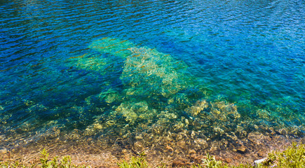 Fototapeta na wymiar Crystal clear water of some hidden Rila lakes, Rila mountain, Bulgaria.