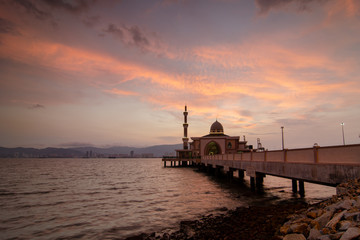 Amazing sunset over architecture Mosque at Penang Port, Penang.