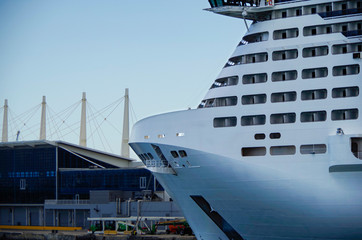 Big modern cruiseship or cruise ship liner MSC Meraviglia in Port of Miami, Florida with downtown...