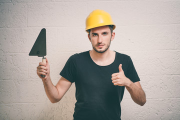 Builder with trowel