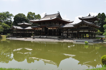 Naklejka premium Wooden temple in a garden. Kyoto, Japan.
