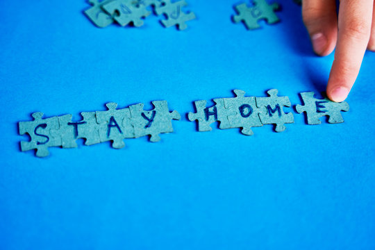 Stay Home, words and mercury thermometer on blue background