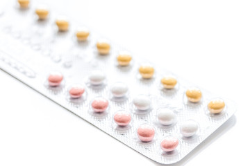 concept of female contraception on white background