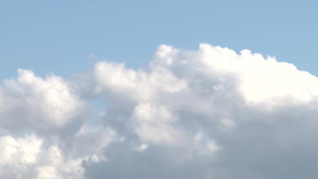 thirteen minutes of footage condensed into Forty-Four Seconds of fluffy Cumulus clouds shot outside of my back yard at Noon in the California Bay Area.