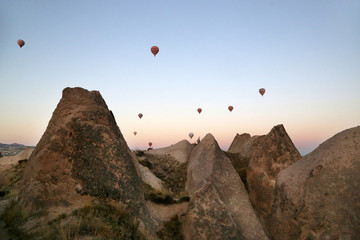 Göreme, Turkey - 09/20/2019: View from the observation deck of the Red Valley on the flight of balloons over the valleys of Cappadocia.