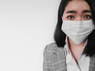 Virus scare Asian woman woman shocked wearing coronavirus mask protection looking scared on white background