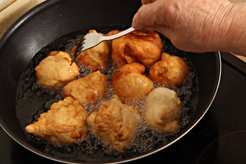 Traditional Bosnian and Balkan donuts, prepared in a pan