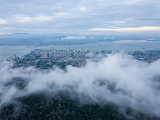Sea cloud over rainforest and Penang Island.