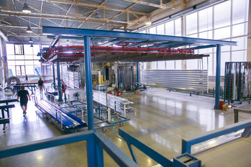 Industrial plant for production of metal profile for windows
