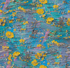 Seamless painted wood texture with fungus growing. Colorful multiple painted surfaces: blue, turquoise, rosa and purple. Yellow and white fungus or moss growing on the wood. Close up.