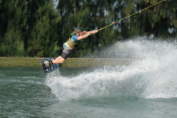 Young athlete Of Thailand is practicing sportWater Board at the wake park canal 6 on October 7, 2018.