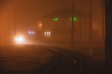 Cars on the highway in the fog. Dangerous overtaking. Scene with traffic offense