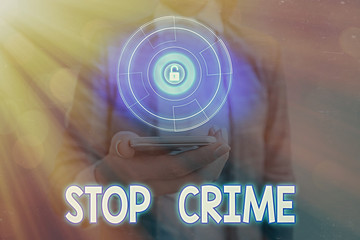 Conceptual hand writing showing Stop Crime. Concept meaning the effort or attempt to reduce and...