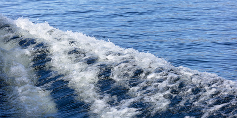 Naklejka premium sculpted edges of the water. beautiful separation of water into a smooth surface and a storm. Blue Art. Water Banner. Ocean Texture. Waves Surface as Background & texture ripples lake