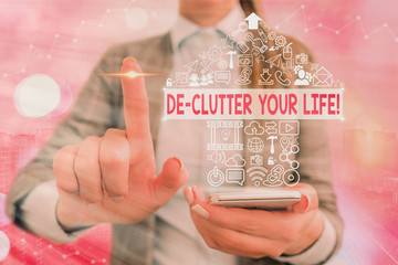 Writing note showing De Clutter Your Life. Business concept for remove unnecessary items from...