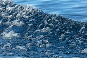 beautiful separation of water into a smooth surface and a storm. Blue Art. Water Banner. Liquid Ice. Icy Pattern. Ocean Texture. Abstract magical blue water. Water Waves Surface as Background