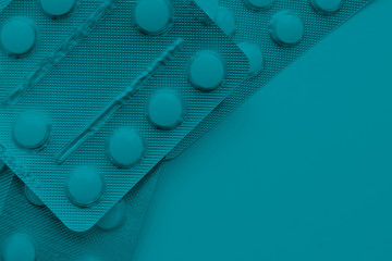 Many  tablets in the package (blister) Background on the topic of illness, health, treatment and medicine.