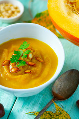 pumpkin soup on wooden surface