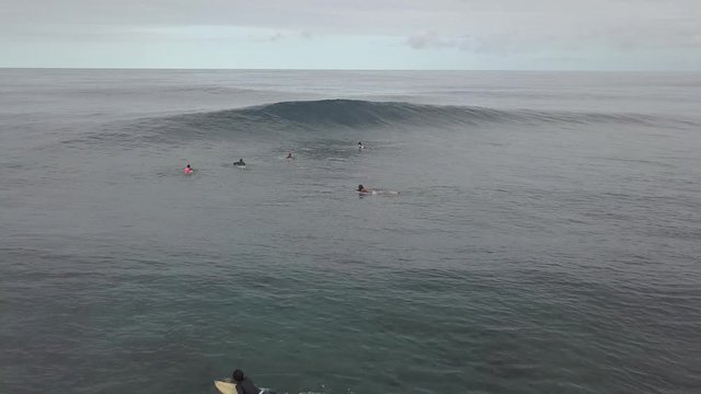 Aerial of surfers at Cloud 9 surfing spot on Siargao island - the capital of surfing of Philippines