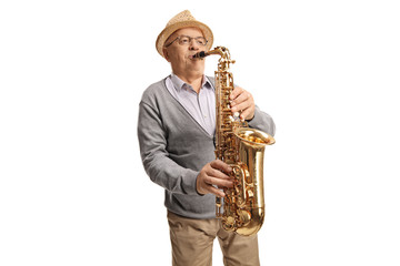 Fototapeta na wymiar Senior man playing a saxophone