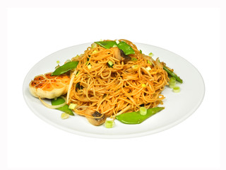 Noodles with mushrooms, green beans and garlic on white round plate