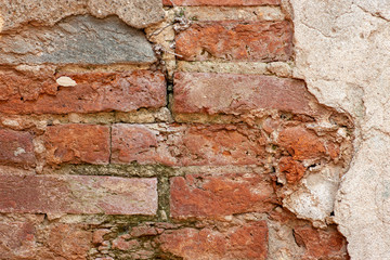 Particular of Old red brick wall background texture