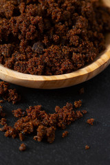 molasses sugar on wooden surface