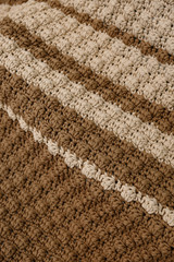 Knitted carpet or rug. Antique handmade carpet. Home hobby.