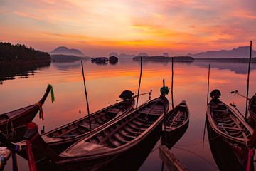 Ban Sam Chong Tai is very popular for passionate photographers who come here to capture beautiful and colorful sunrises that emerges behind the giant limestone mountains