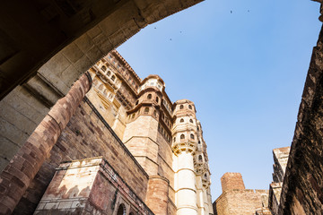 (Selective focus) Stunning view of the ancient Mehrangarh Fort during a beautiful sunny day. Jodhpur, Rajasthan, India. Mehrangarh (Mehran Fort) is one of the largest forts in India.