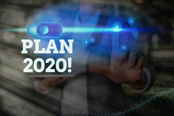 Conceptual hand writing showing Plan 2020. Concept meaning detailed proposal doing achieving...