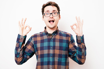 man shows gesture ok