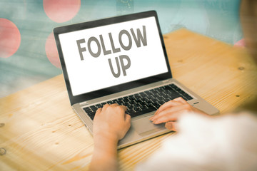 Conceptual hand writing showing Follow Up. Concept meaning Additional info or any activity that...